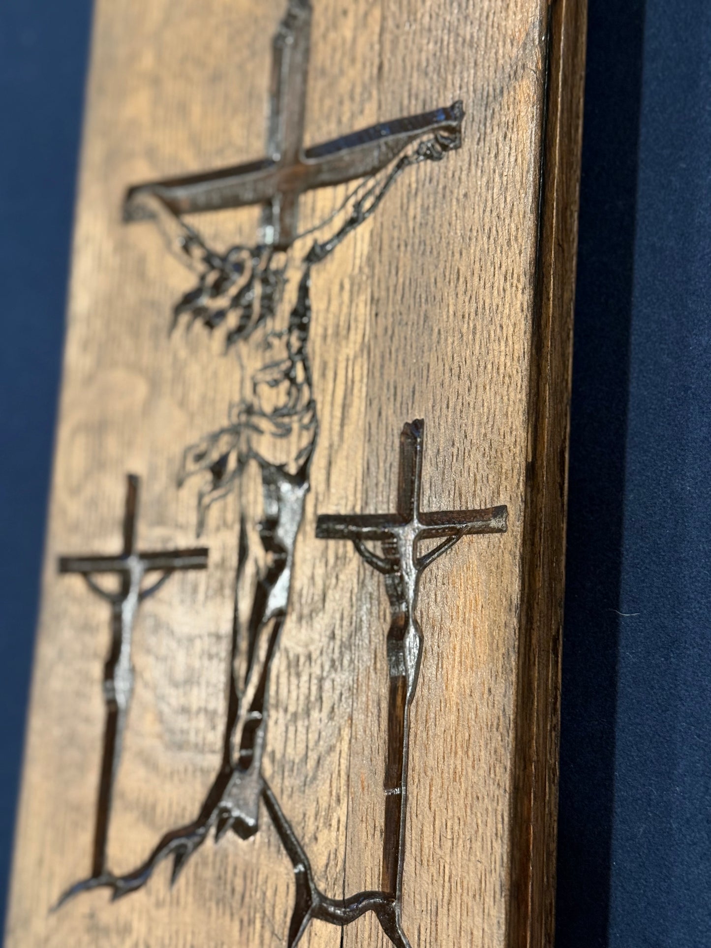 closer image of Crucifixion with two thieves on 1/4 Bourbon Barrel Head