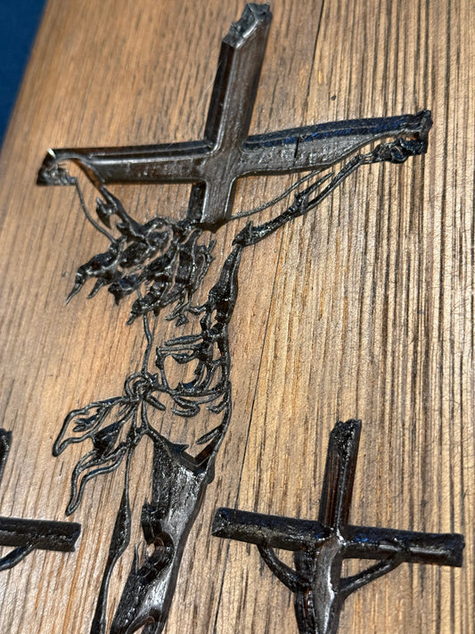 closer image of Crucifixion with two thieves on 1/2 Bourbon Barrel Head
