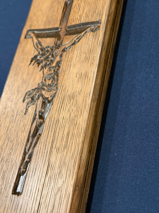 closer image of Christ on the cross on 1/4 bourbon barrel head