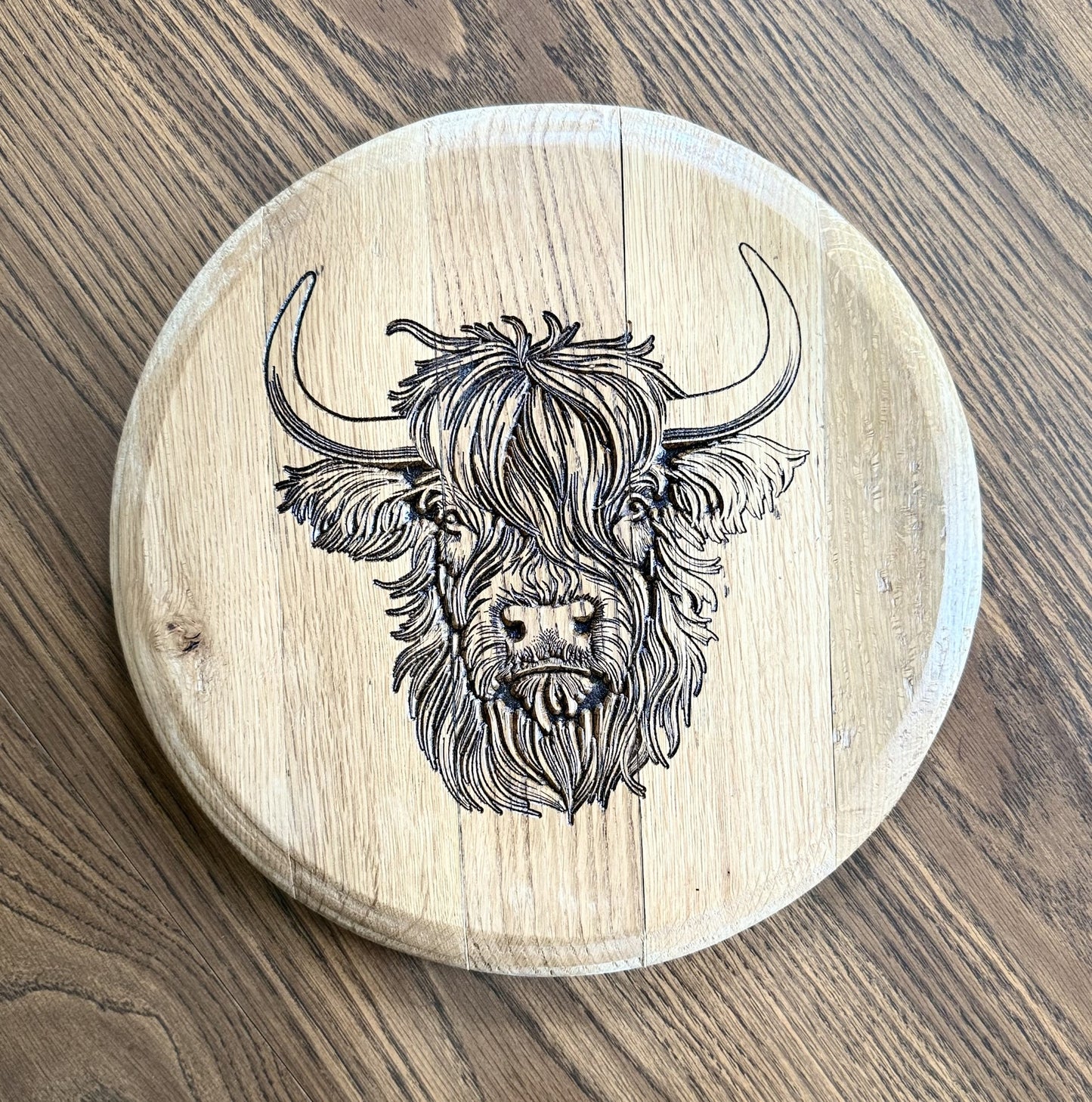 Highland cow on 13.5" Diameter Bourbon Barrel head